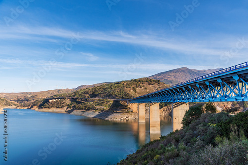 Viaducts over the Rules dam in Granada, with Sierra Nevada in the background.