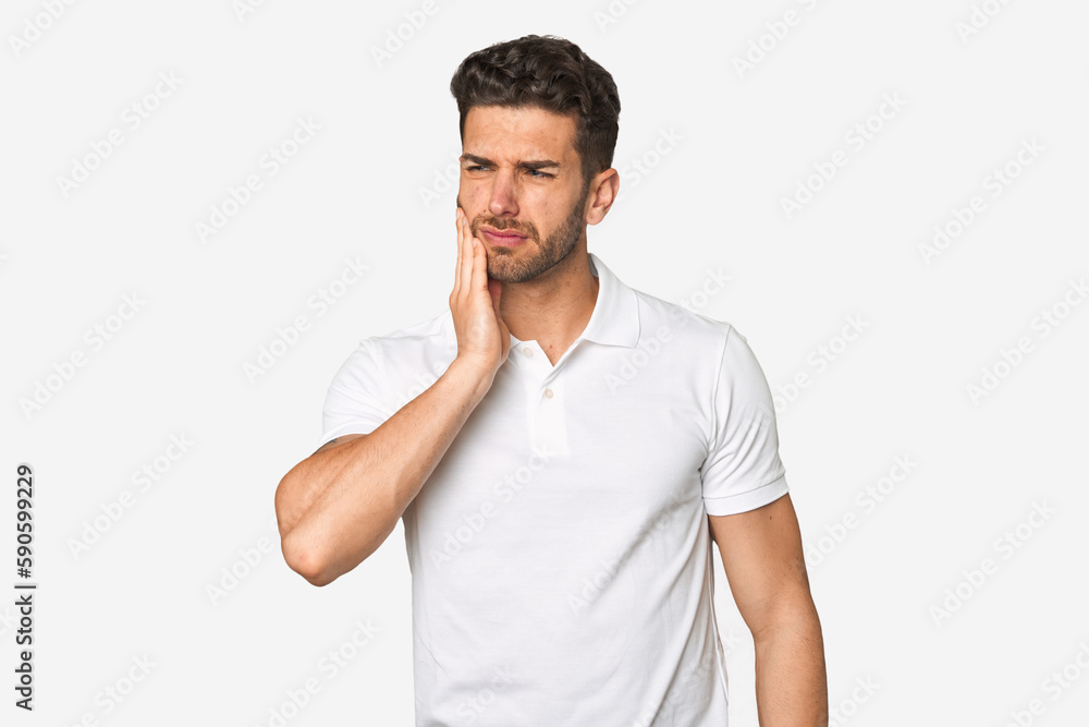 Young handsome man isolated having a strong teeth pain, molar ache. Young handsome man isolated having a strong teeth pain, molar ache.
