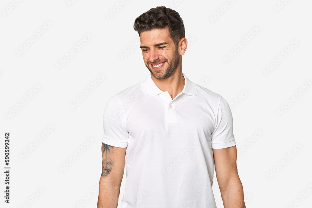 Fototapeta premium Young handsome man isolated laughs and closes eyes, feels relaxed and happy.
