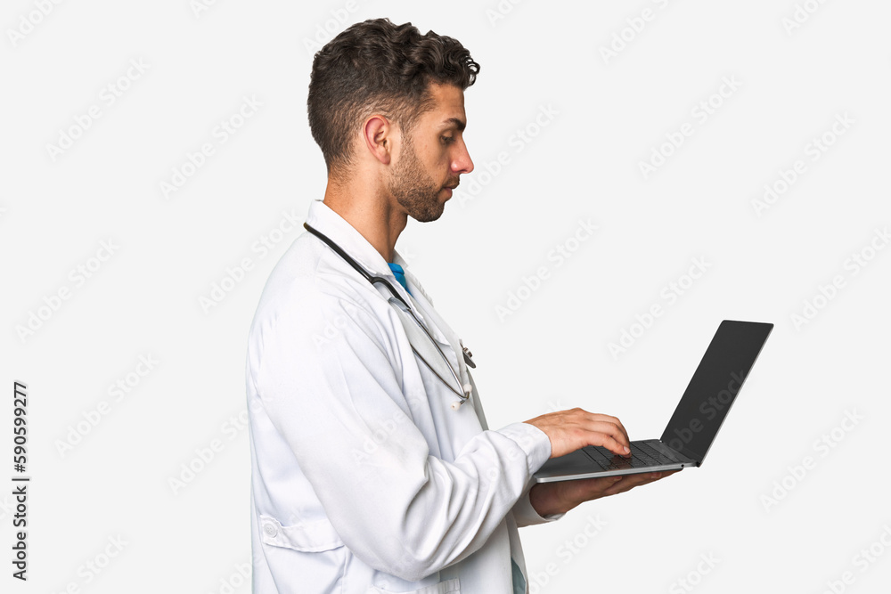 Medical professional working on laptop. Medical professional working on laptop.