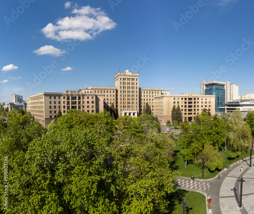Aerial city view on Karazin National University northern building on Freedom square  green park and blue sky in spring Kharkiv  Ukraine