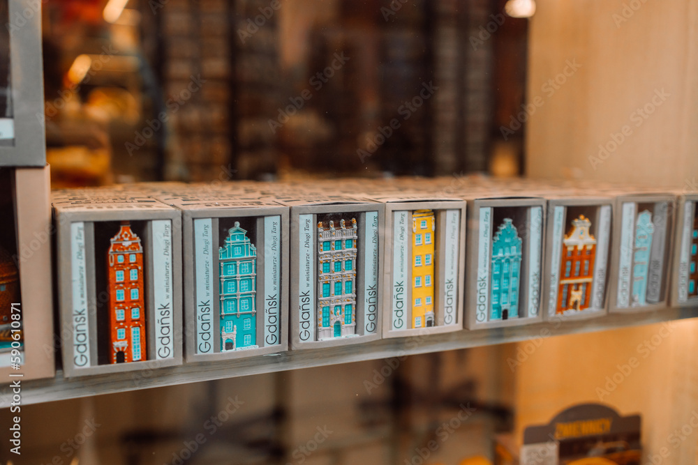 Color ceramic houses, Famous souvenir miniature in a shop window from Gdansk, Poland display on the market, Vintage housing background. High quality photo Color ceramic houses, Famous souvenir miniature in a shop window from Gdansk, Poland display on the market, Vintage housing background. High quality photo
