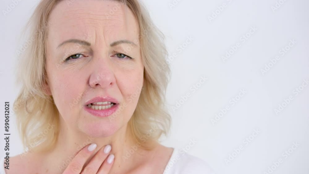 panic attack woman holds hand on chest touches throat with fingers sore