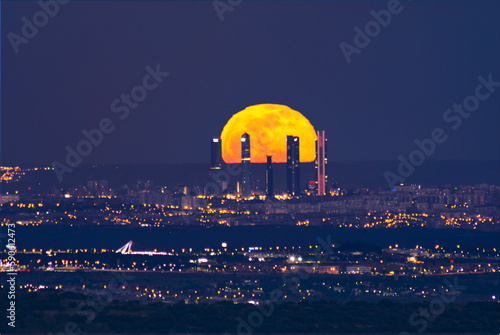 luna sobre las torres de madrid photo