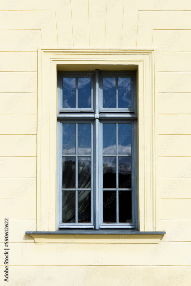 Simple window background. Urban architecture. Yellow paint facade. Simple window background. Urban architecture. Yellow paint facade.