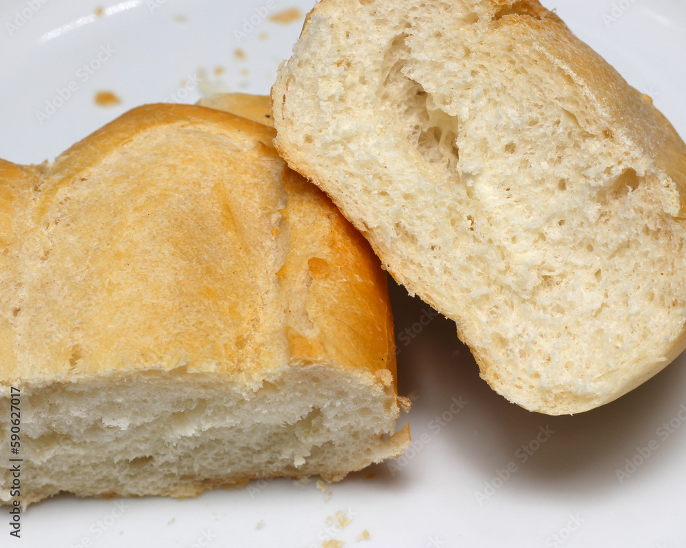 slices of bread. food known in Brazil as French bread. bread cut in half. bread texture. slices of bread. food known in Brazil as French bread. bread cut in half. bread texture.