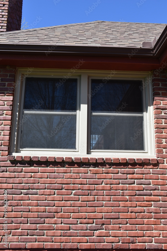 Windows in a Brick Wall of a House
