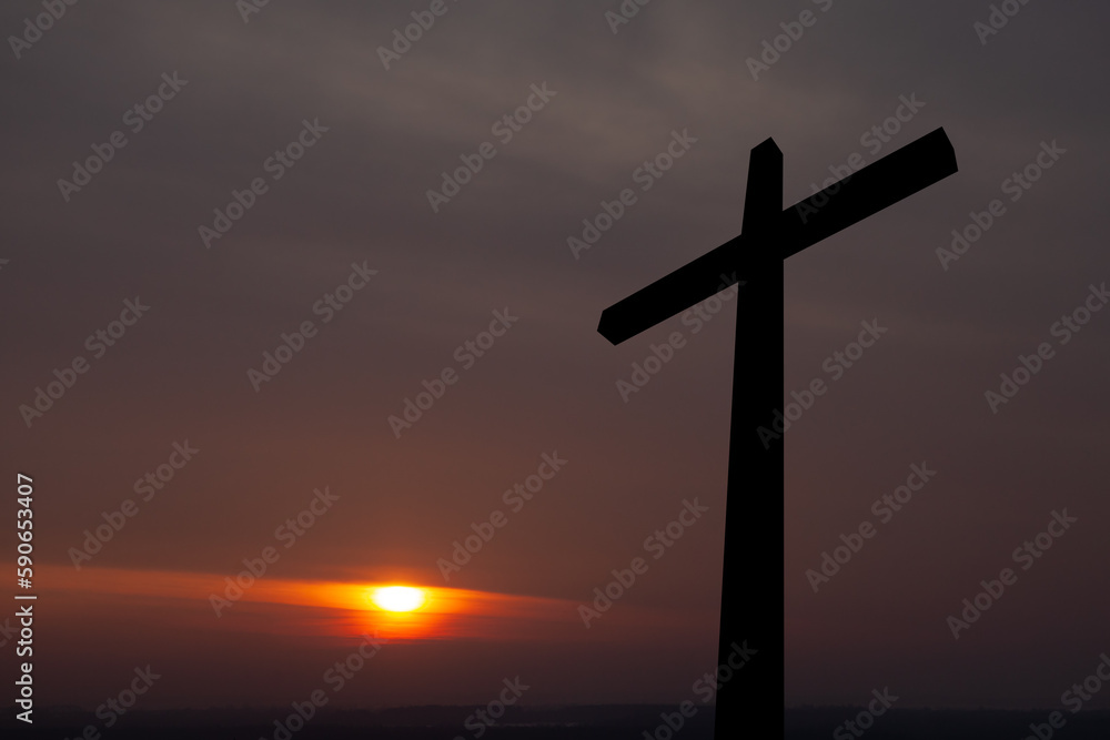 Christian cross at sunrise. Resurrection of Jesus. Concept photo. Christian cross at sunrise. Resurrection of Jesus. Concept photo.