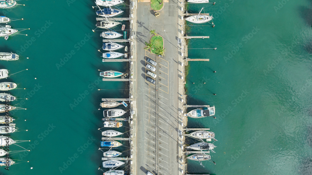 Boats harbor. Yachts in marina. Aerial drone top-down view.