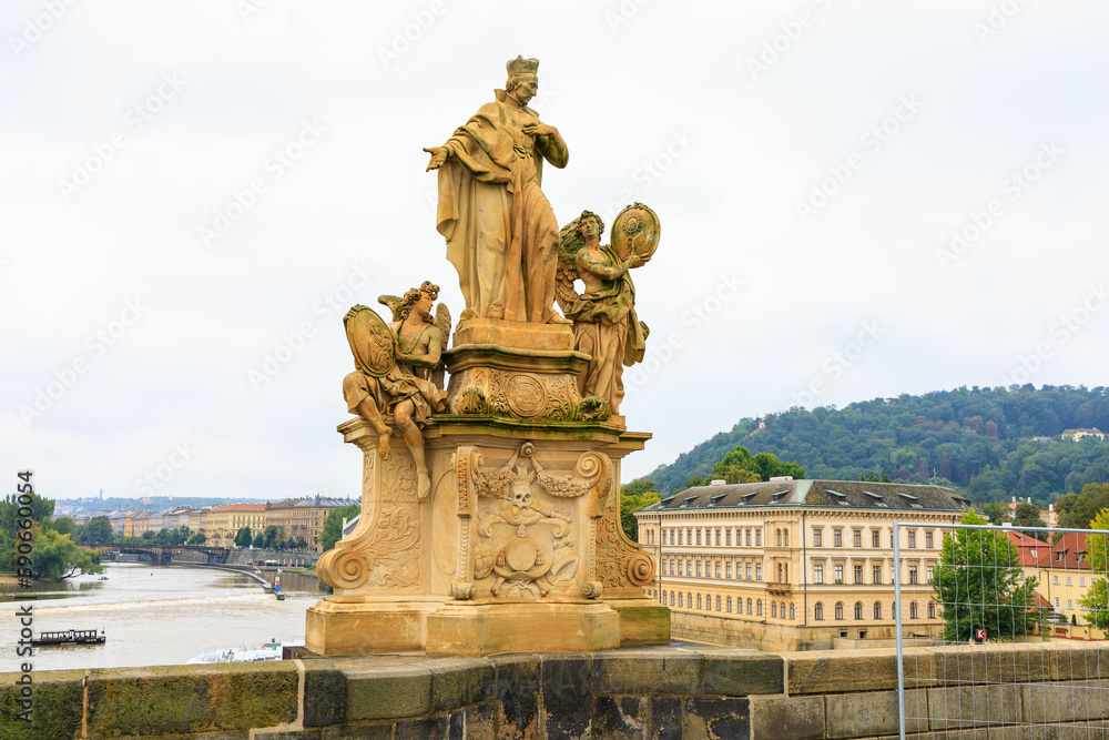 Fototapeta premium Ancient medieval sculptures on the Charles Bridge. Background with selective focus