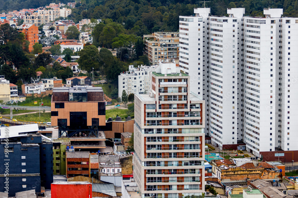 Fototapeta premium Residential buildings with hill in the background in Bogota, Colombia