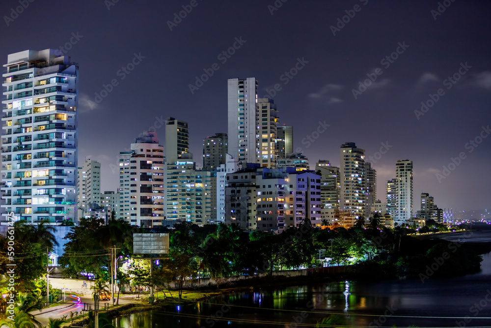 Panoramic night view of buildings with port in the background in Cartagena de Indias, Colombia