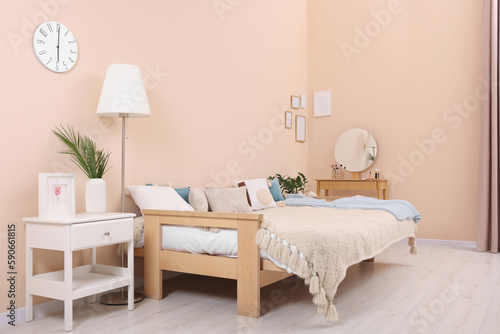 Cozy room interior with comfortable sofa bed. Multifunctional furniture