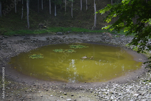 Kaali Crater of a meteor in Saarema Island, Estonia photo