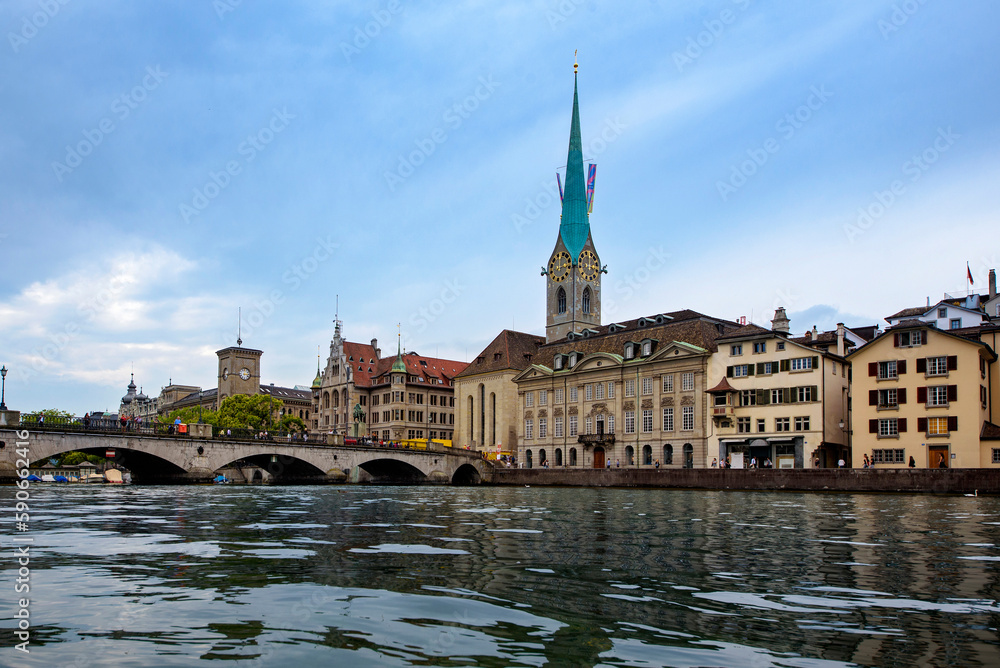 Fototapeta premium Zurich, Switzerland. View of the historic city center with famous Fraumunster Church, on the Limmat river.