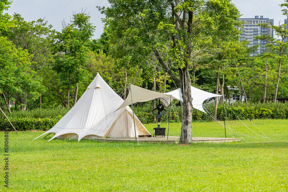 Camping tents on the grass in the park