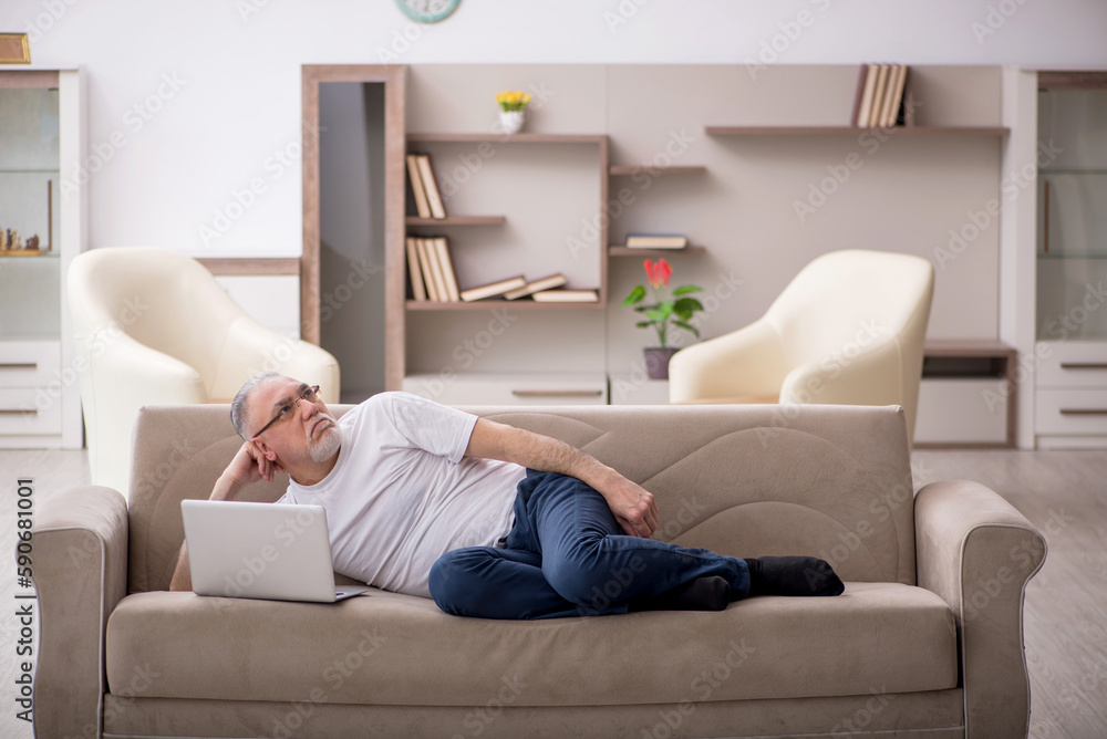 Old man sitting at home Old man sitting at home