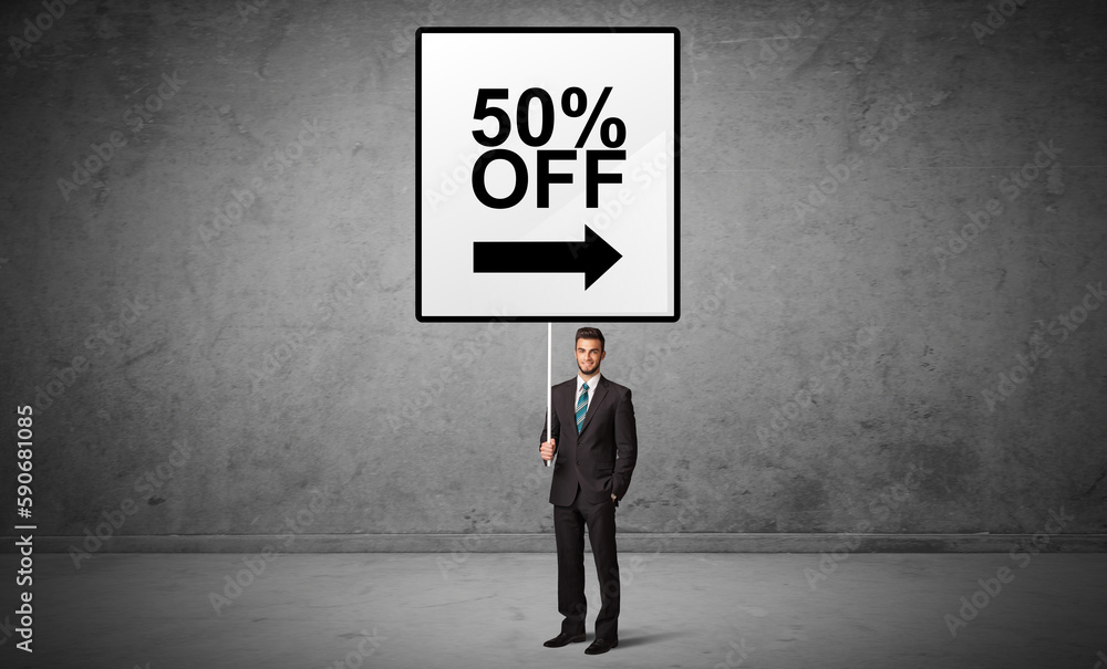 business person holding a traffic sign concept business person holding a traffic sign concept