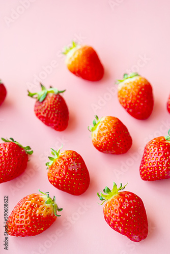 Fresh ripe strawberries collection on pink. Set of organic summer berry fruits.