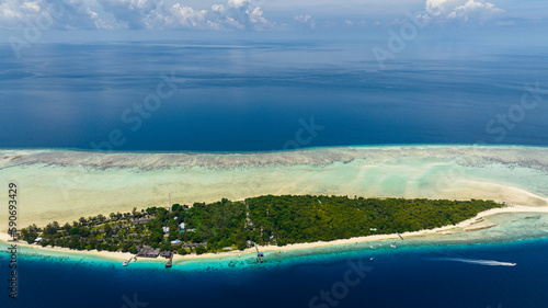 Beautiful island with sandy beach in tropical sea. Mataking islet.Tun Sakaran Marine Park. Borneo, Sabah, Malaysia.