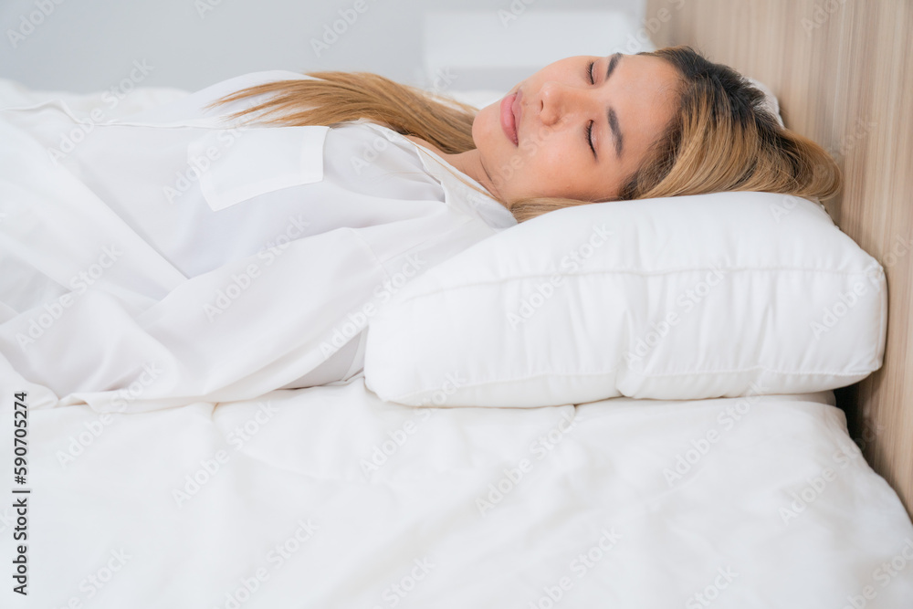 cute asian girl funny on bed with pillow cute asian girl funny on bed with pillow