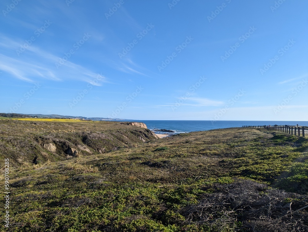 Half Moon Bay rocky shore, Pacific Ocean beach view, San Francisco coastline, California cliffed coast, abrasion coast