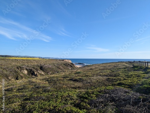 Half Moon Bay rocky shore, Pacific Ocean beach view, San Francisco coastline, California cliffed coast, abrasion coast