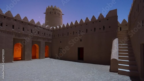 Mezairaa Fort at night sky start time lapse. Fort in Liwa city, Abu Dhabi. photo
