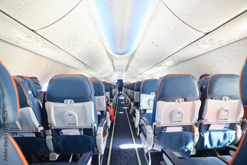 interior of the aircraft, a row of seats in the flight of the aeroplane © kichigin19