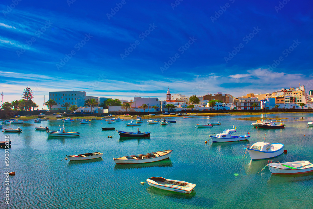 Fisher boats at the laguna Charco de San Gines at sunrise, city of Arrecife, Lanzarote, Canary Islands