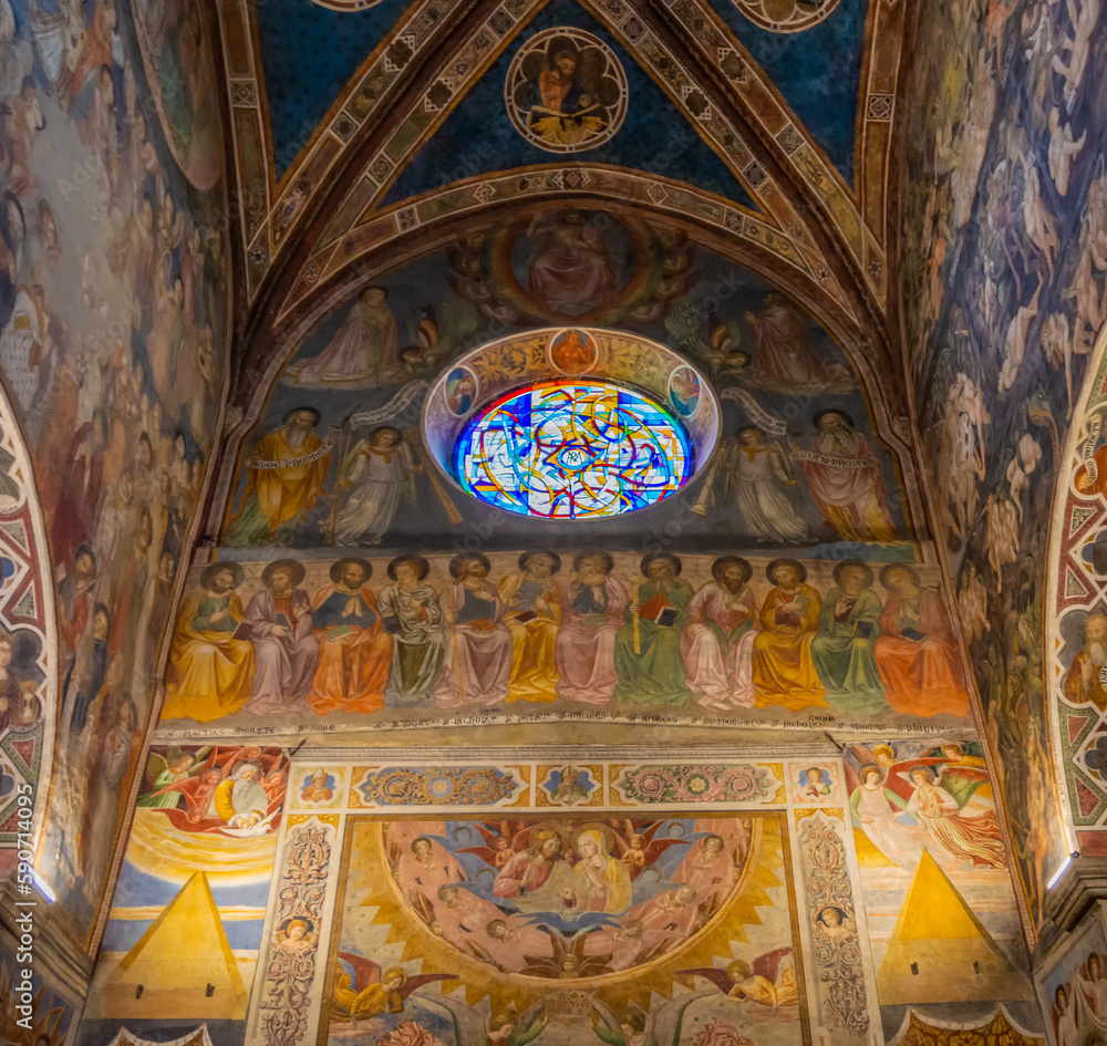 Collegiate Church of Santa Maria Assunta, San Gimignano - sculptures and frescoes inside the church . Province of Siena, Tuscany, Italy, Europe - June 2, 2021