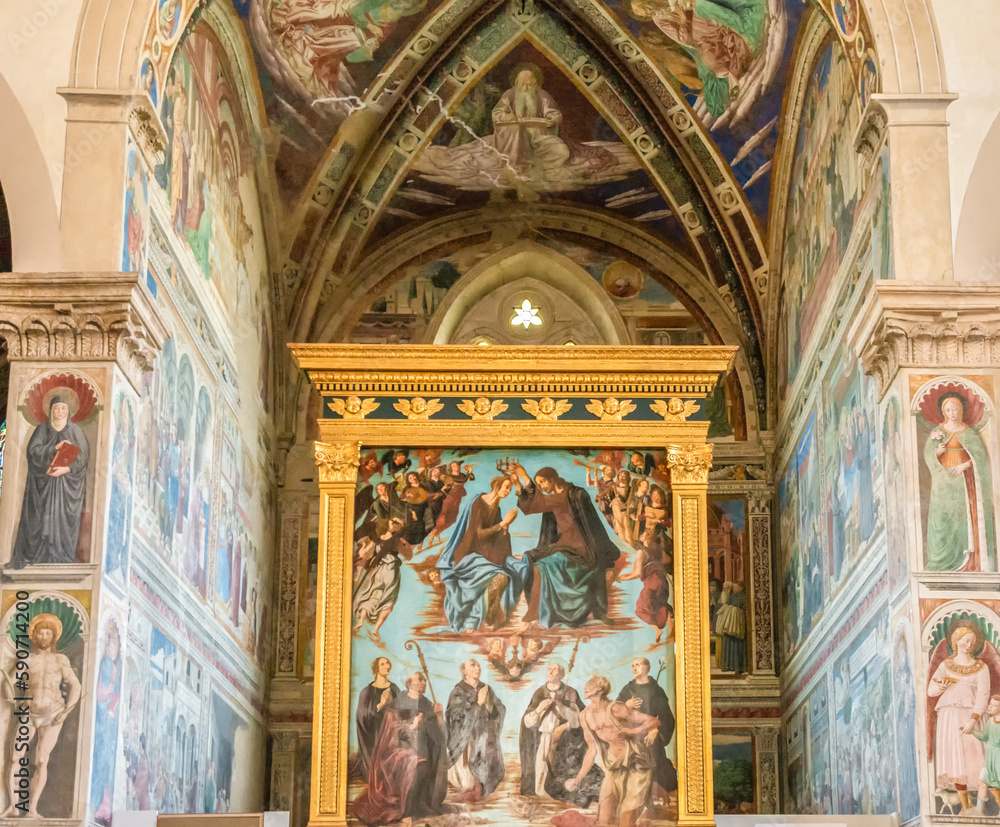 interior of the St.Augustine church: painting that decorates - Coronation of the Madonna- the main altar is a masterpiece from 1483 by Piero del Pollaiolo - Siena province,Tuscany, Italy