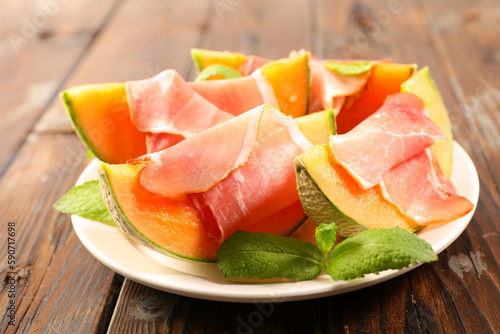 melon slice with prosciutto ham