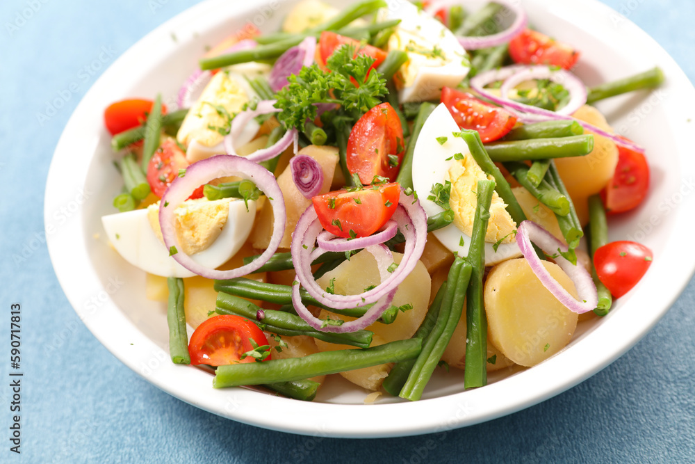 mixed vegetable salad with tomato, egg, bean and potatoes