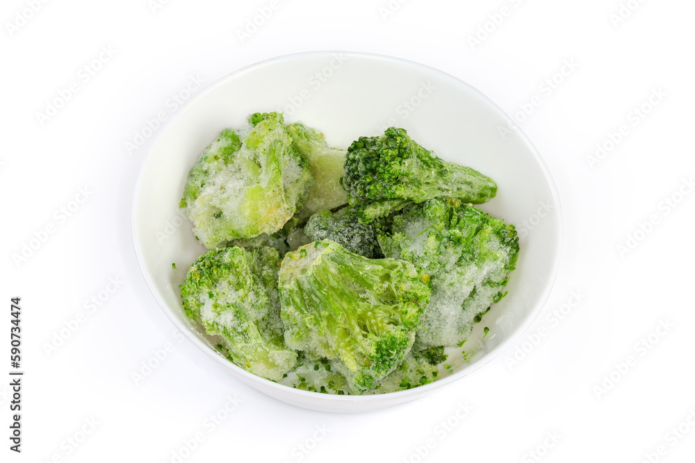 Frozen broccoli in white bowl on a white background Frozen broccoli in white bowl on a white background