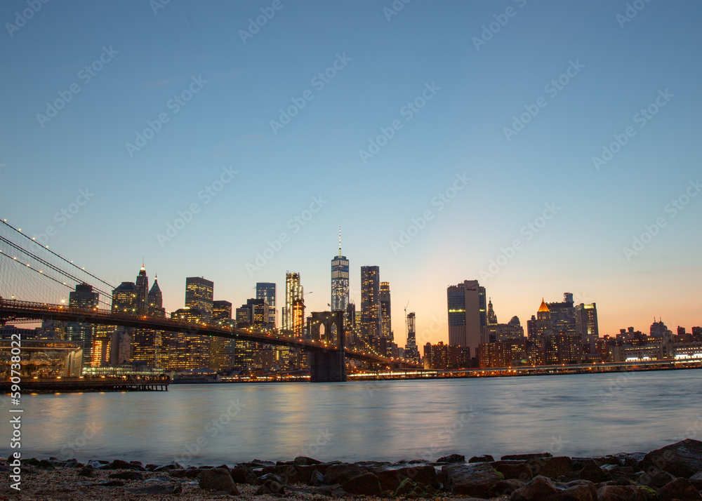Fototapeta premium sunset new york city skyline with Brooklyn bridge