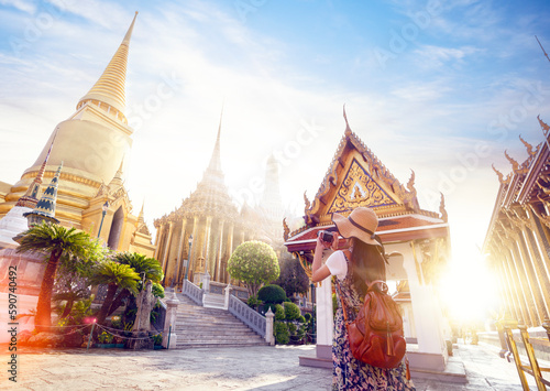 Asian woman traveller take a photo and travel in Bangkok grand palace and wat phra kaew in Bangkok city photo