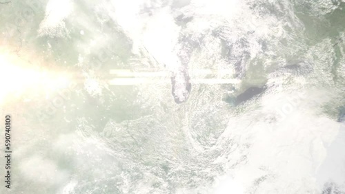 Earth zoom in from outer space to city. Zooming on Skokie, Illinois, USA. The animation continues by zoom out through clouds and atmosphere into space. Images from NASA photo