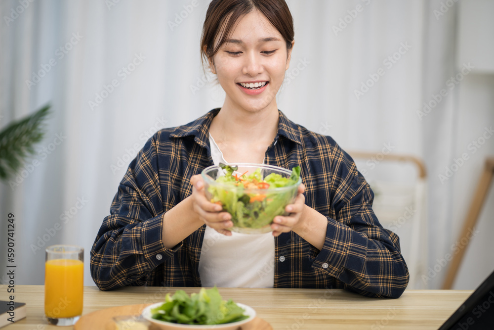 Asian woman dieting Weight loss eating fresh fresh homemade salad healthy eating concept Asian woman dieting Weight loss eating fresh fresh homemade salad healthy eating concept