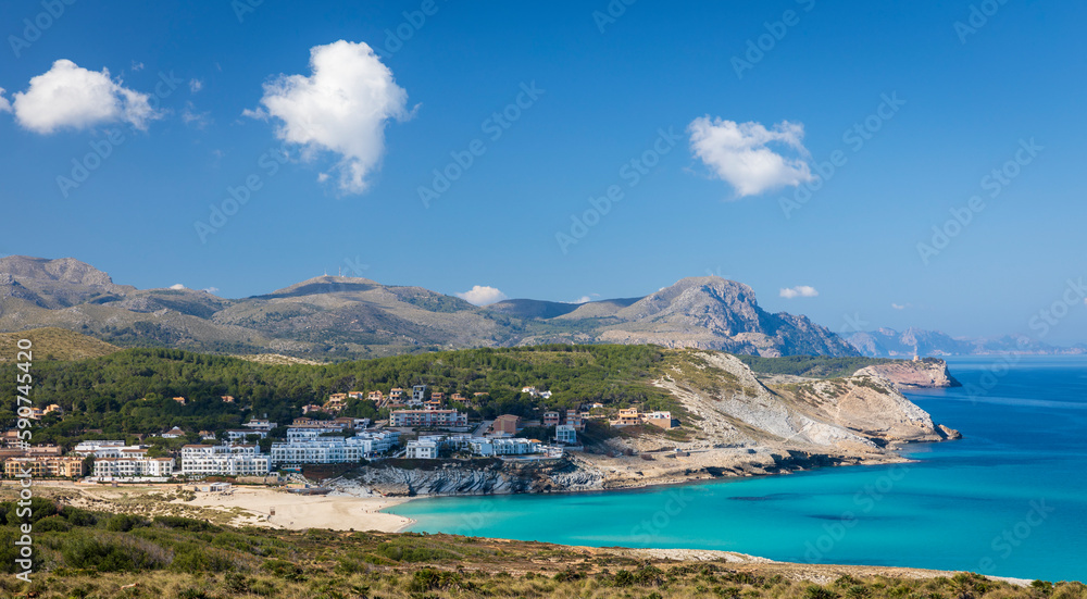 Hiking from Cala Agulla and approaching the beautiful beach and bay of Cala  Mesquida over the Llevant hills Majorca Spain