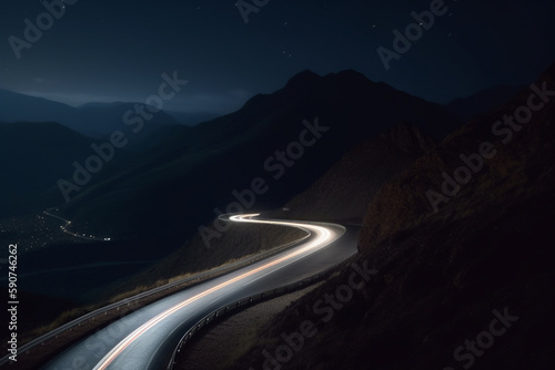 Night Drive on a Curvy Mountain Road with Long Exposure Light Trails © artefacti