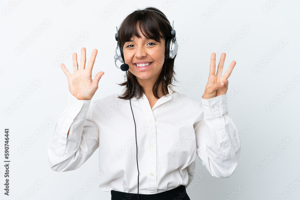 Telemarketer mixed race woman working with a headset isolated on white background counting eight with fingers Telemarketer mixed race woman working with a headset isolated on white background counting eight with fingers