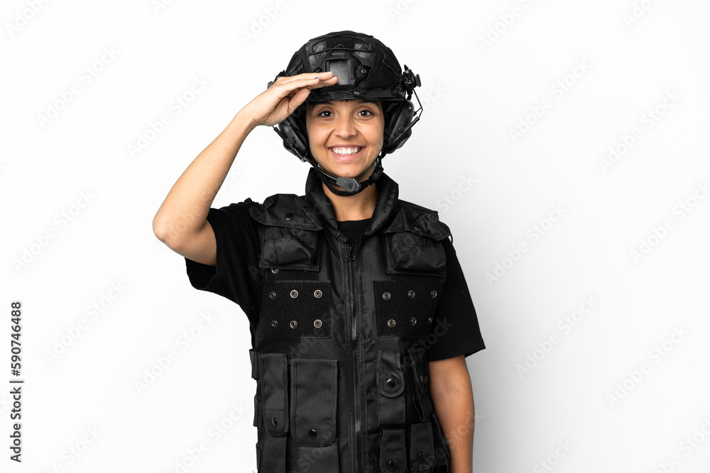 SWAT woman isolated on white background saluting with hand with happy expression SWAT woman isolated on white background saluting with hand with happy expression