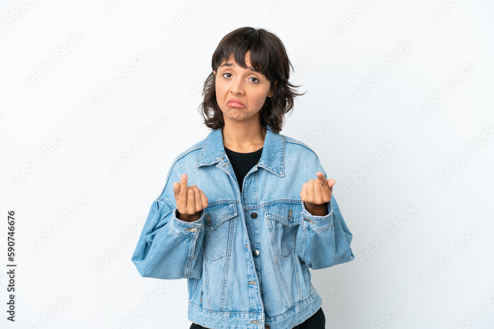 Young mixed race woman isolated on white background making money gesture but is ruined Young mixed race woman isolated on white background making money gesture but is ruined