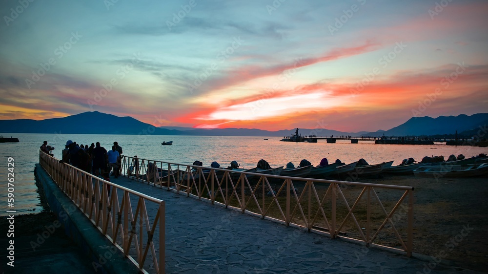 Landscape of a group of people near Lake Chapala during the sunset in Mexico