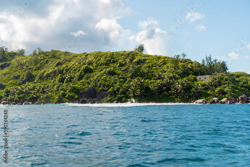 Moyenne Island is surrounded by stunning scenery, with crystal clear waters, lush vegetation, and towering granite rocks. The island also offers panoramic views of the surrounding ocean  photo