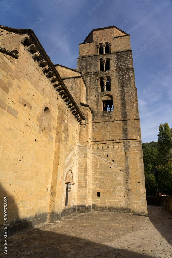 Santa Maria romanesque church in the beautiful village of Santa Cruz de la Seros in a sunny day in Huesca, Aragón, Spain.