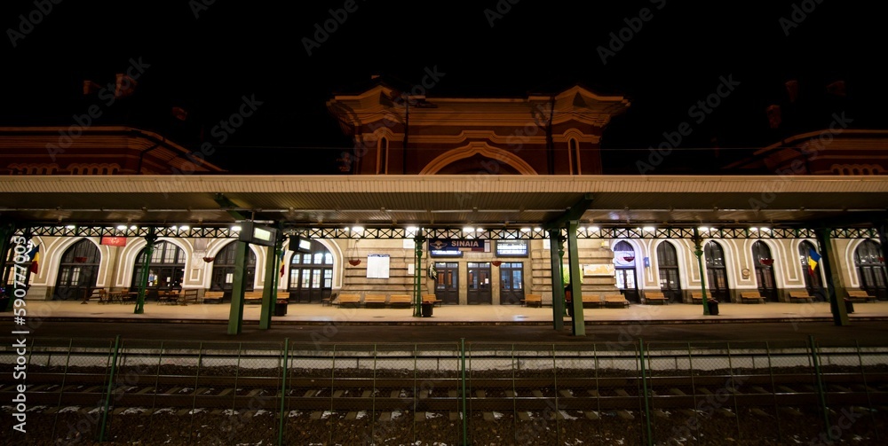 Fototapeta premium Platform in a train station at night