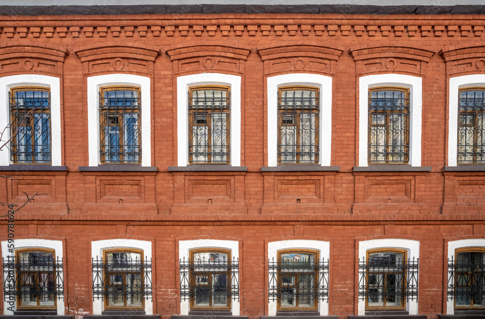 Fototapeta premium An old two-storey red brick house.