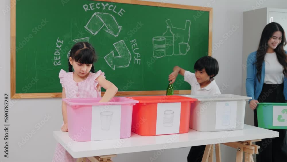 Teacher woman is teaching a class on selecting and separating waste for